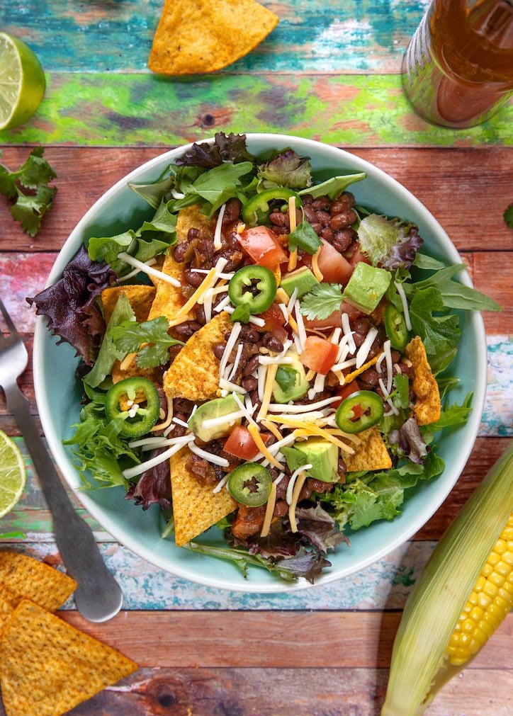 Hot and Cool Layered Black Bean Taco Salad - The Vegan Atlas