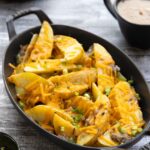 Vegan poutine (cheese fries with gravy)