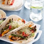 Vegan tacos with grilled tofu, herbs and vegetables