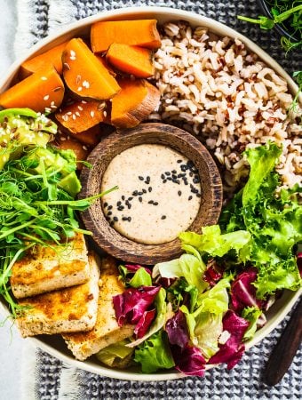 Buddha Bowl With Tofu, avocado, and vegetables
