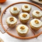 Vegan cranberry orange muffins with maple cream cheese frosting