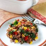 Red quinoa pilaf with kale and corn
