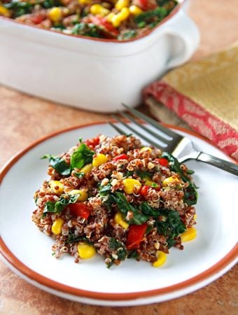 Red quinoa pilaf with kale and corn
