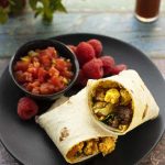 Vegan breakfast burritos with tofu and plant-based sausage
