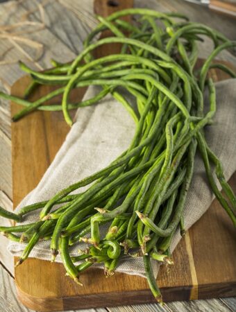 Chinese Long Beans on cutting board