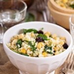 Rice and chickpea salad with spinach and raisins