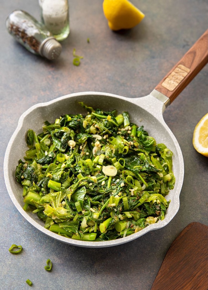 Mustard greens with-spinach in skillet