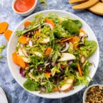 Mustard greens salad with apples & pecans or walnuts