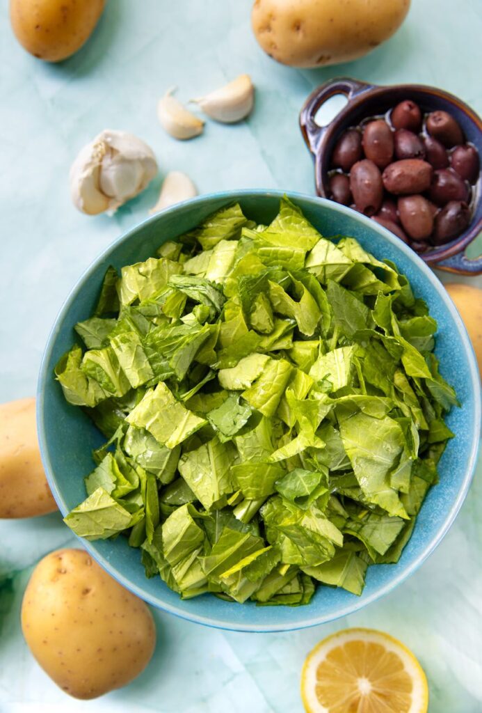 Garlicky Potatoes with Mustard Greens and Olives