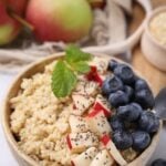 Quinoa breakfast bowl with fruit and seeds