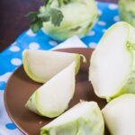 Green kohlrabi on a cutting board