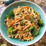 Peanut tempeh noodles with broccoli and baby carrots