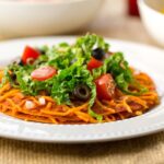 Stacked vegan cheese enchiladas