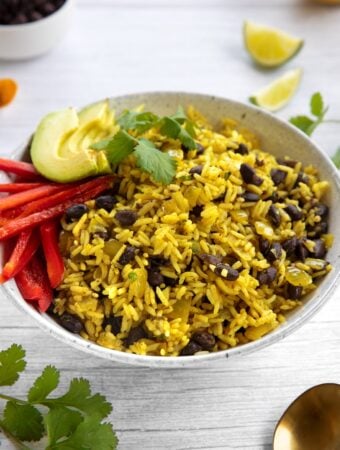 Coconut Yellow Rice and Black Beans in a bowl