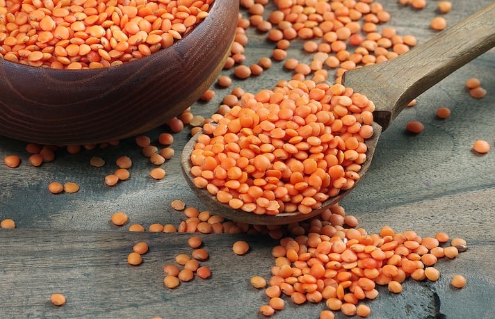 Lentils with a Wooden Spoon and Bowl